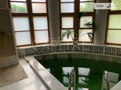 Продаж 4 поверхового будинку з гаражем і ділянкою на 22 сотк
