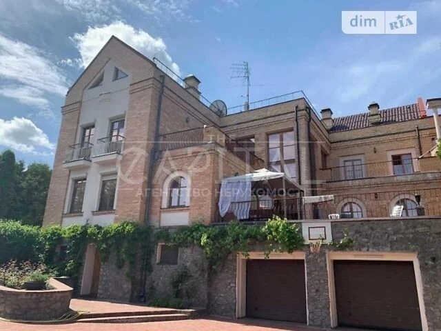 Продаж 4 поверхового будинку з гаражем і ділянкою на 22 сотк