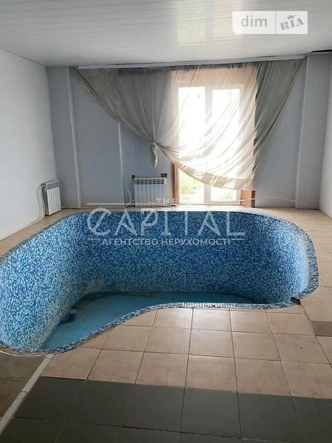 Продаж 3 поверхового будинку з гаражем і ділянкою на 8 соток