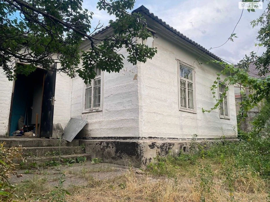 Продам Дом в городе с участком 5,5 соток(торг)