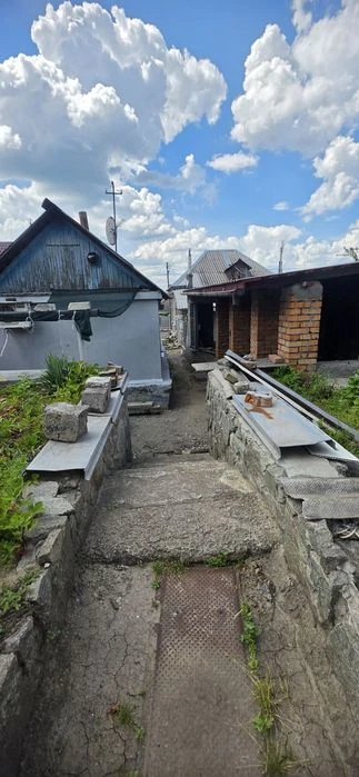 Продам 1/2 дома  по ул.Киевской(Якова Острянина) ,Новокайдац