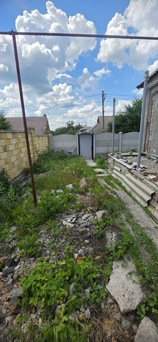 Продам 1/2 дома  по ул.Киевской(Якова Острянина) ,Новокайдац