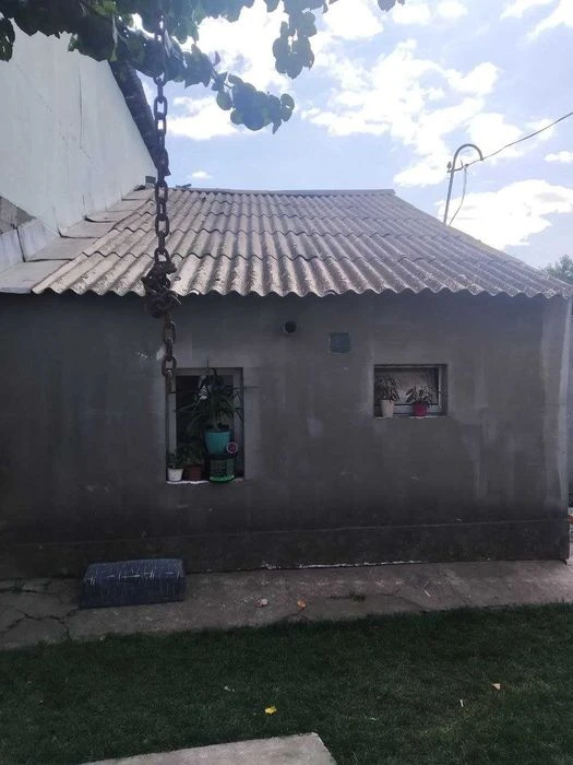Продажа дома в общем дворе.