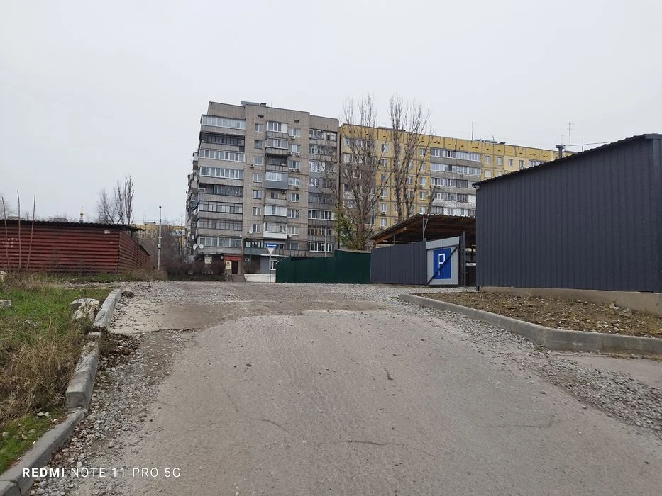 Продам 20 соток под автомобильную парковку на Коммунаре в Дн