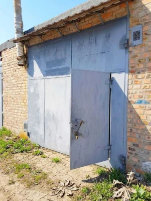 Капітальний цегляний гараж в АК 29 з високими воротами та гр
