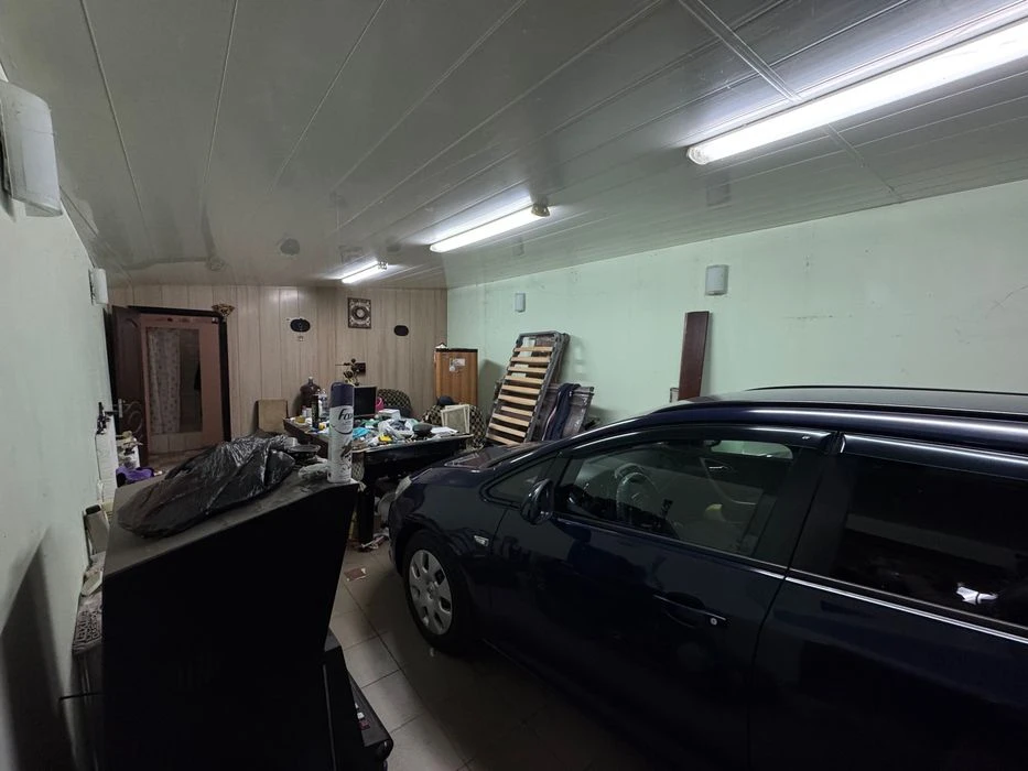 I will sell a stone garage of 100 m2