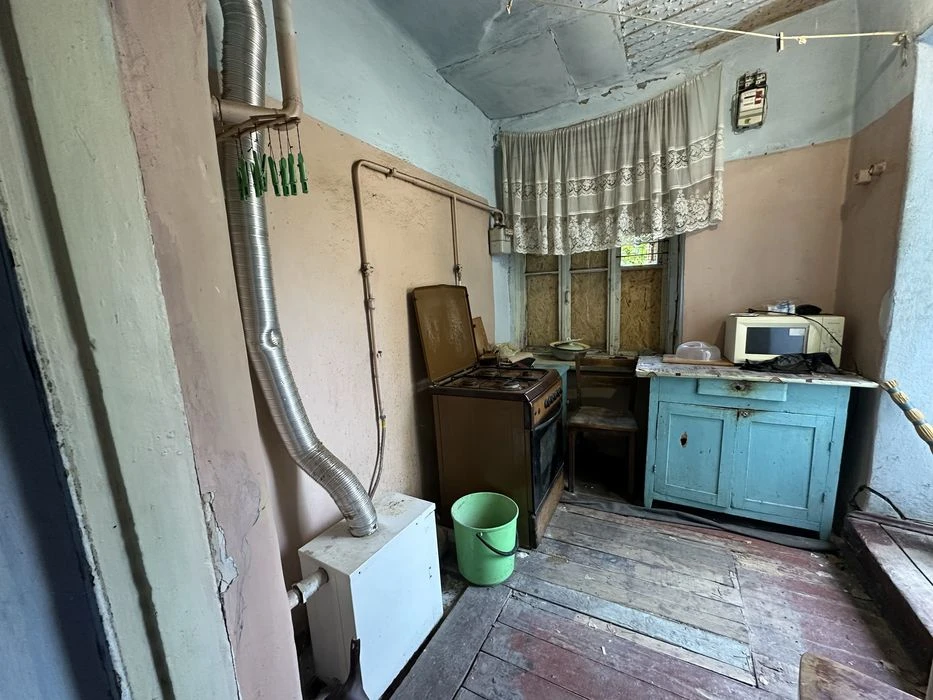 Продаю дом с гаражом в центре