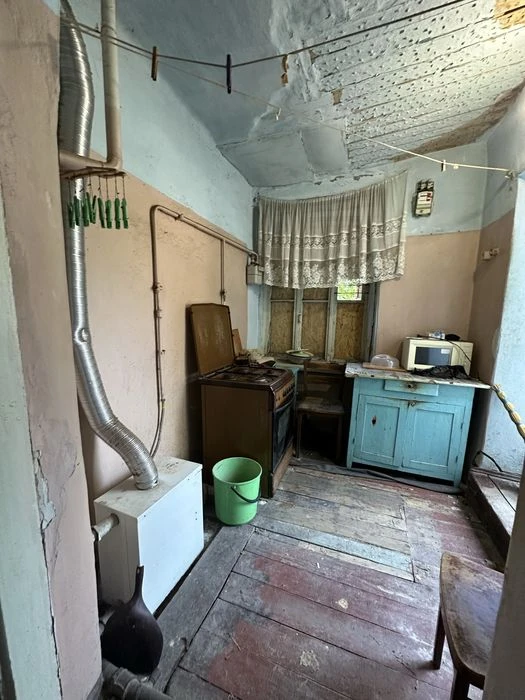 Продаю дом с гаражом в центре