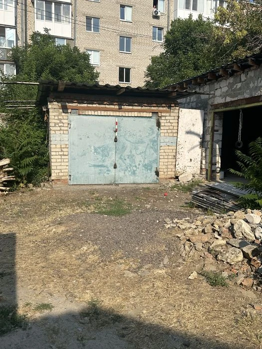 Продаю дом с гаражом в центре