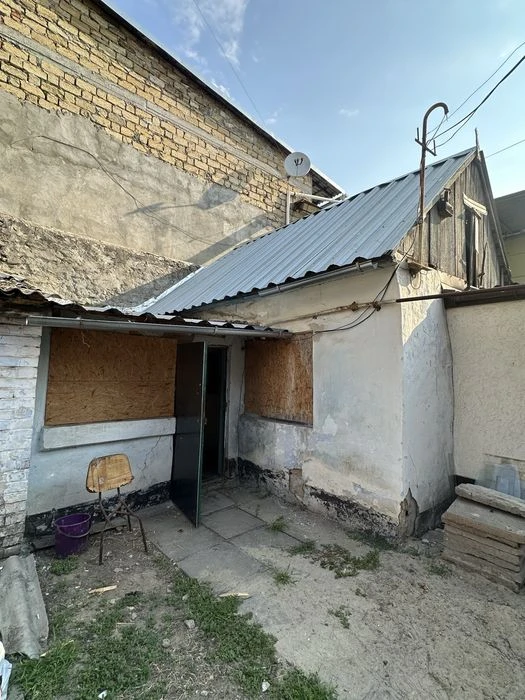 Продаю дом с гаражом в центре