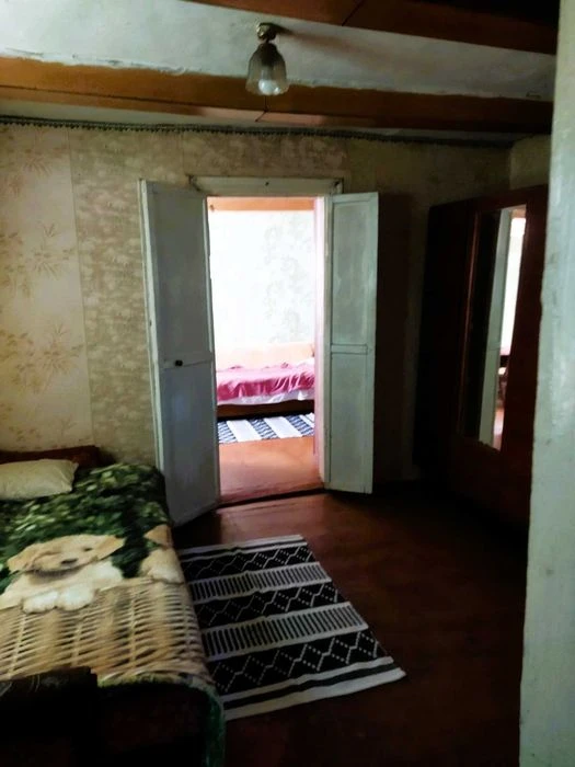 Хатинка з приватизованою ділянкою