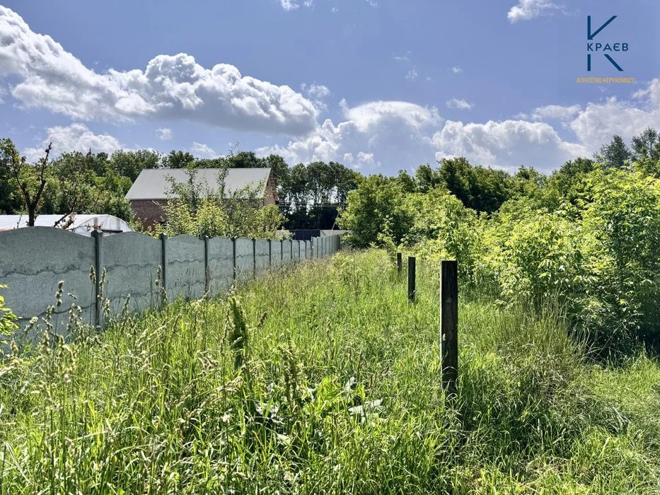 Продам ділянку з будівлею біля Катіону