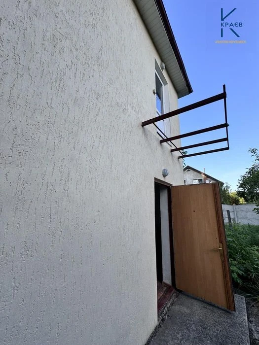 Продам ділянку з будівлею біля Катіону