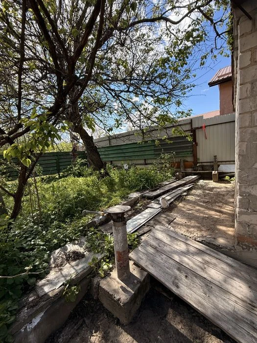 Plot with a house in Shevchenkivskyi microdistrict.