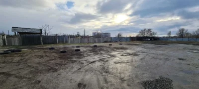 Продаж автостоянки/території. 0.25 га. Октябрьске.