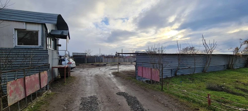 Продаж автостоянки/території. 0.25 га. Октябрьске.