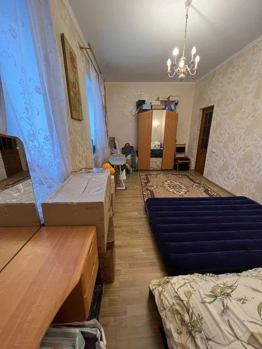 Продается двухуровневая квартира в центре города.