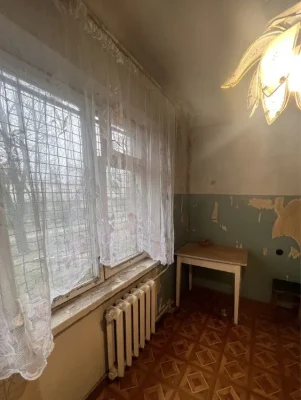 I am selling a one-room apartment on 2 Shevchenkivske Street.
