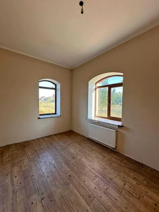 Сучасний двоповерховий будинок 159 м² та ділянкою 10 соток у