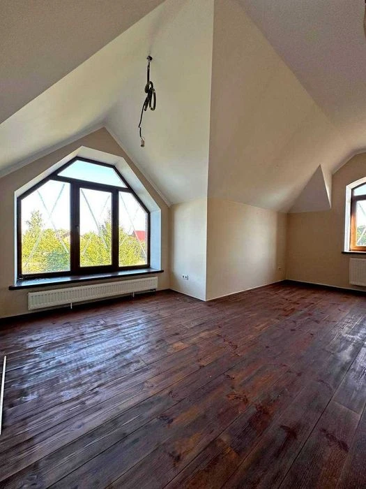 Сучасний двоповерховий будинок 159 м² та ділянкою 10 соток у