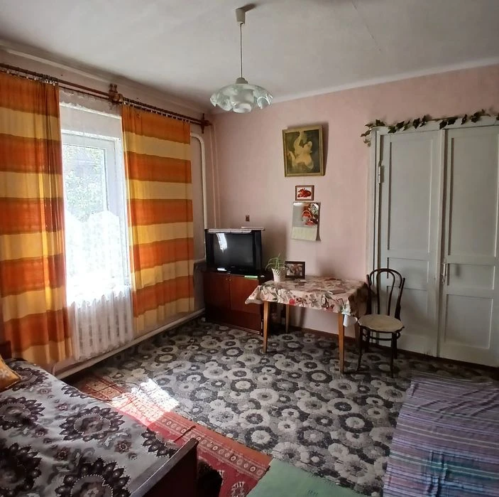 Продаж половини будинку в центрі міста