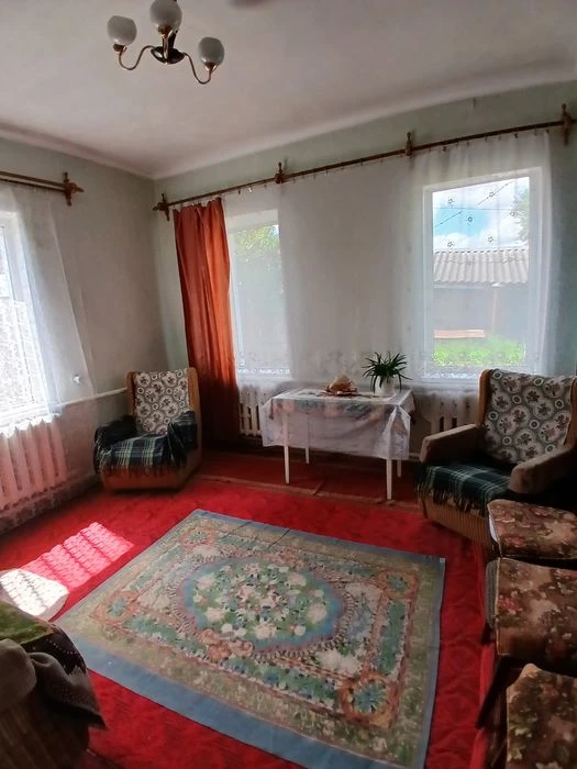 Продаж половини будинку в центрі міста