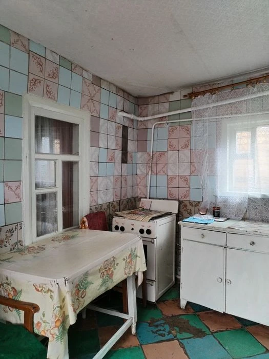 Продам пів будинку в центрі м. Суми - вулиця  Засумська
