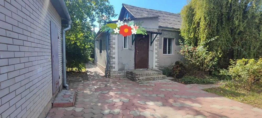 Продається одноповерховий цегляний будинок земельною ділянко