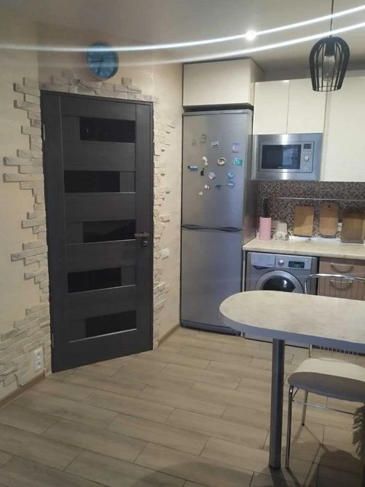 Sale of a modern 2-room apartment (living room type) with euro-floor