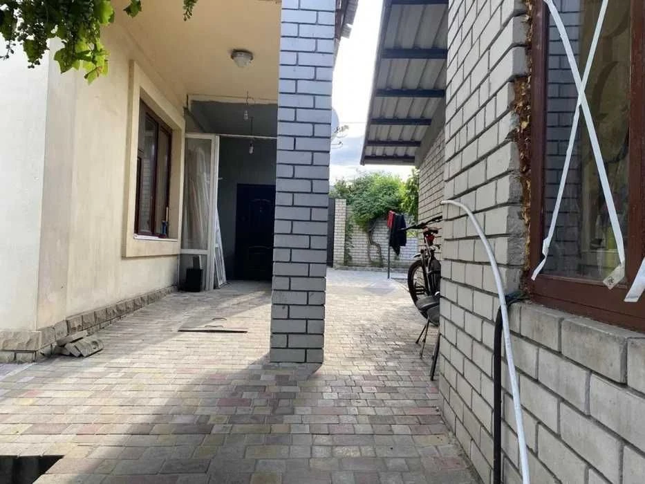 Продам 2-поверховий будинок із власним СТО ЖМ Фрунзенський,