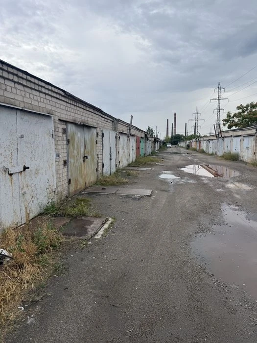 Гараж в кооперативі Каштан-2 з підвалом на Осінній