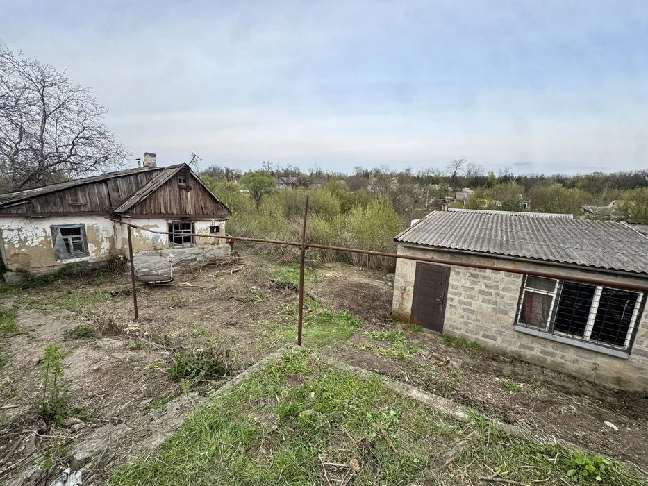 House with a plot of 10 acres + garage, possible exchange for a car.