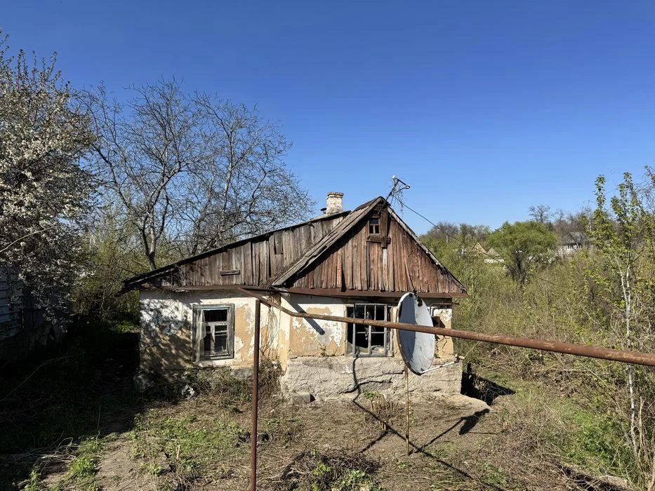 House with a plot of 10 acres + garage, possible exchange for a car.
