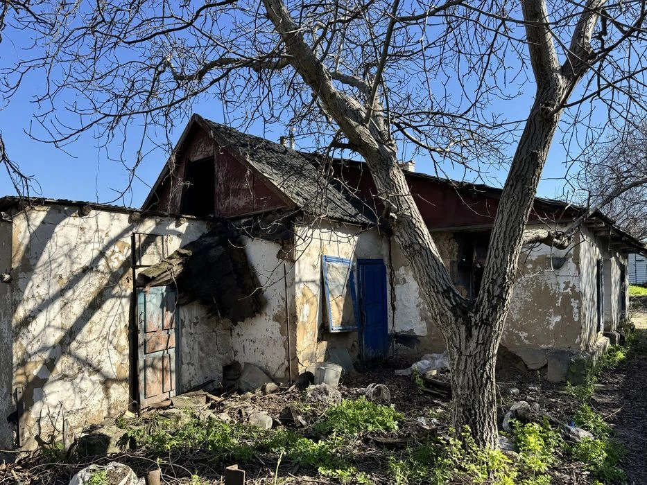 House with a plot of 10 acres + garage, possible exchange for a car.
