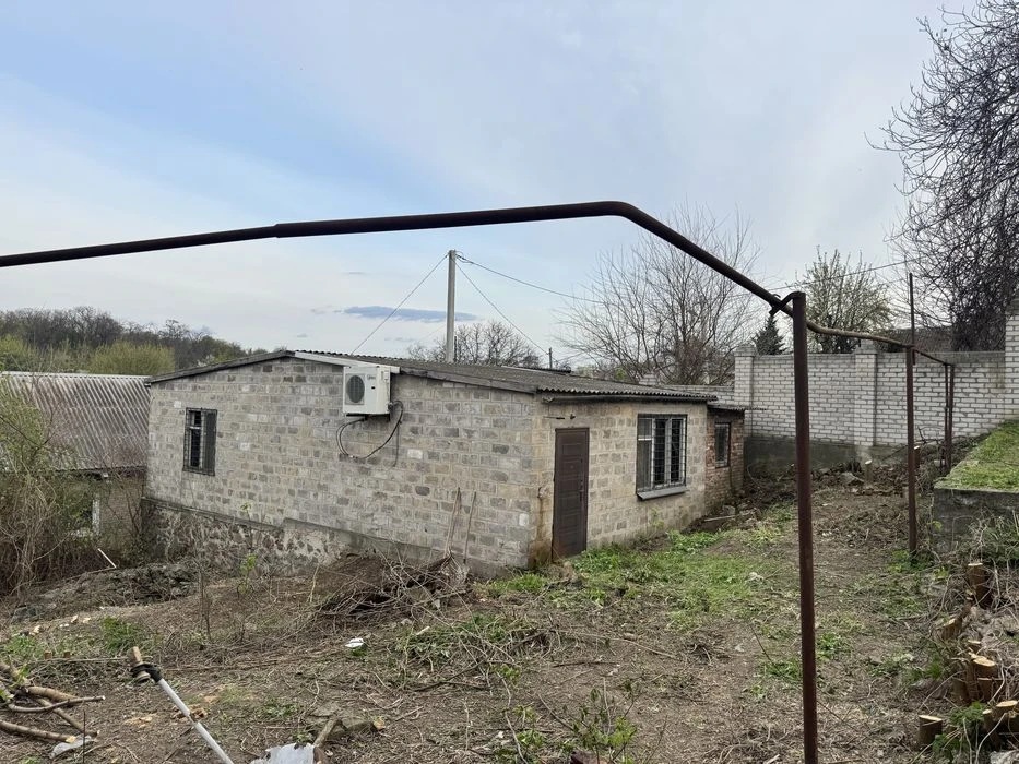 House with a plot of 10 acres + garage, possible exchange for a car.