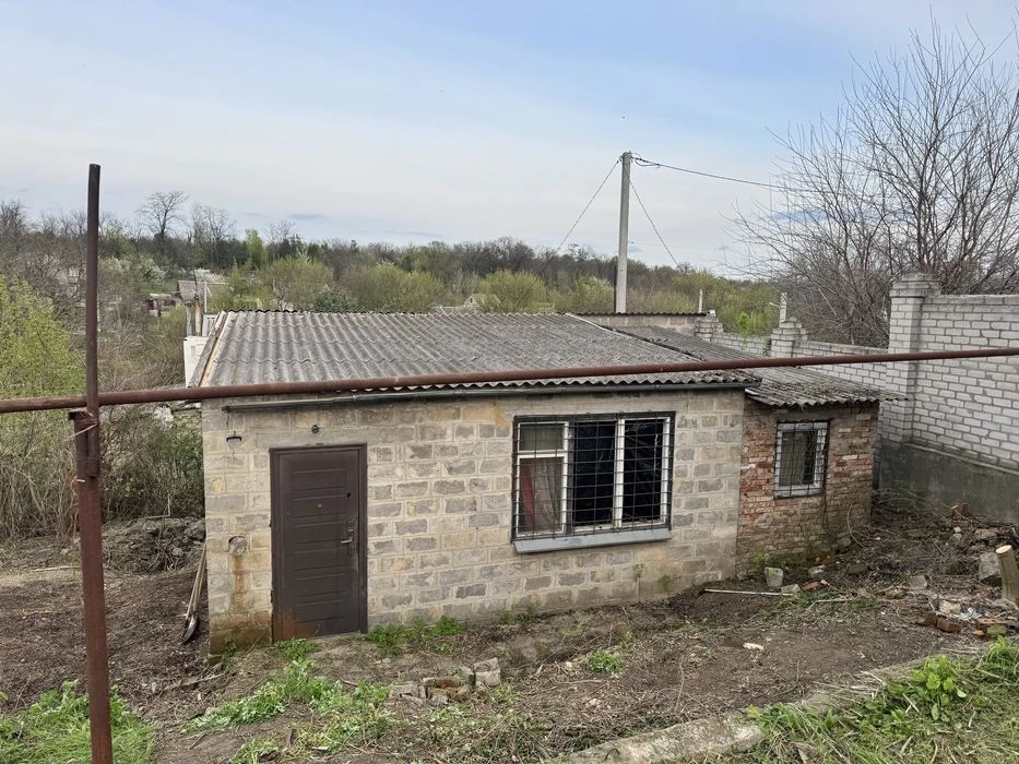 House with a plot of 10 acres + garage, possible exchange for a car.