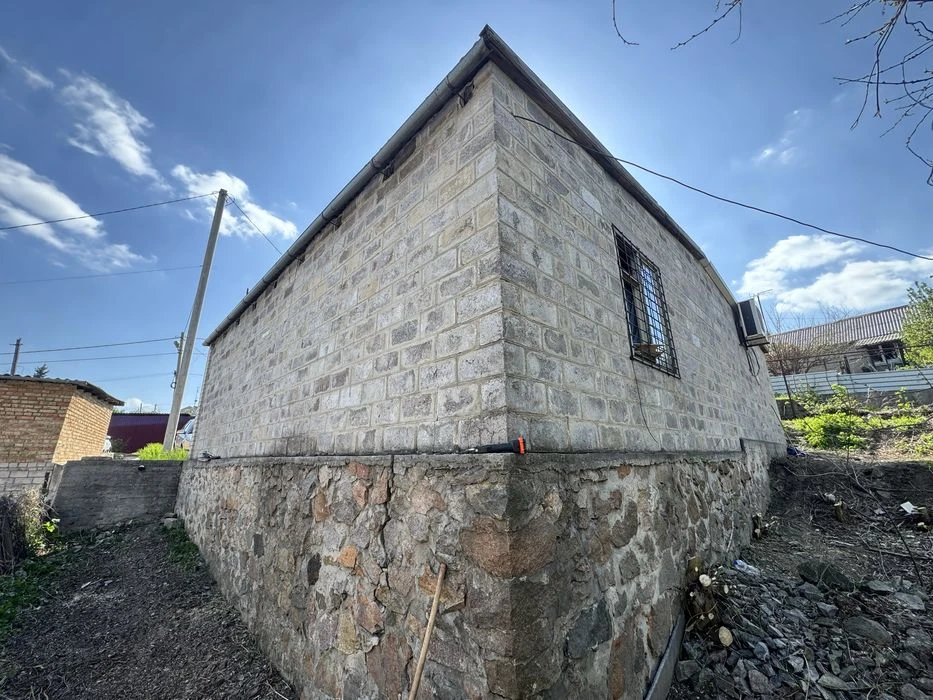 House with a plot of 10 acres + garage, possible exchange for a car.