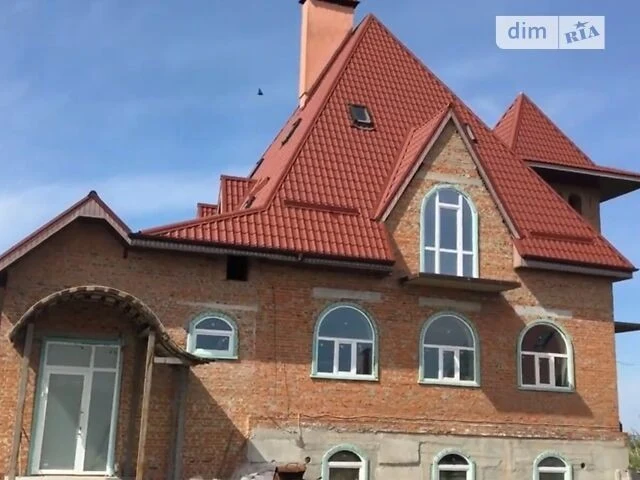 Продаж 3 поверхового будинку з верандою і ділянкою на 1 га,