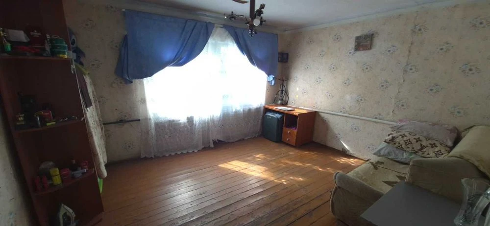 Продам пів будинку на Філіповці.