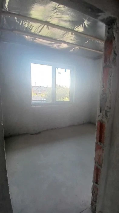 Таунхаус в місті 875 дол. США за м кв.