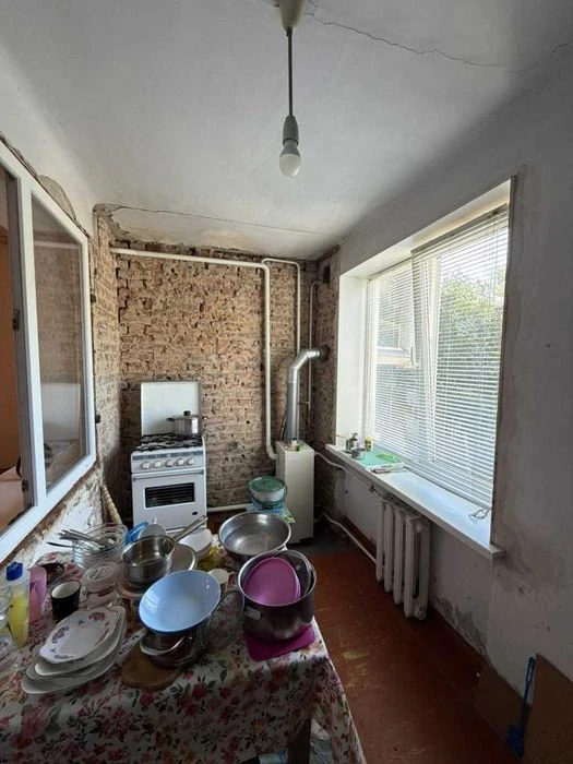 Продаж частини будинку в районі першого міського пляжу