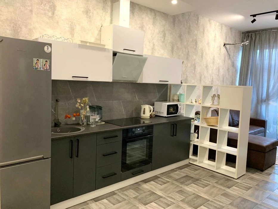 I will sell a cozy bright 2-room studio apartment in the residential complex Baku Center Remon