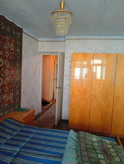 Продажа 4-х комнатной квартиры в центе города.
