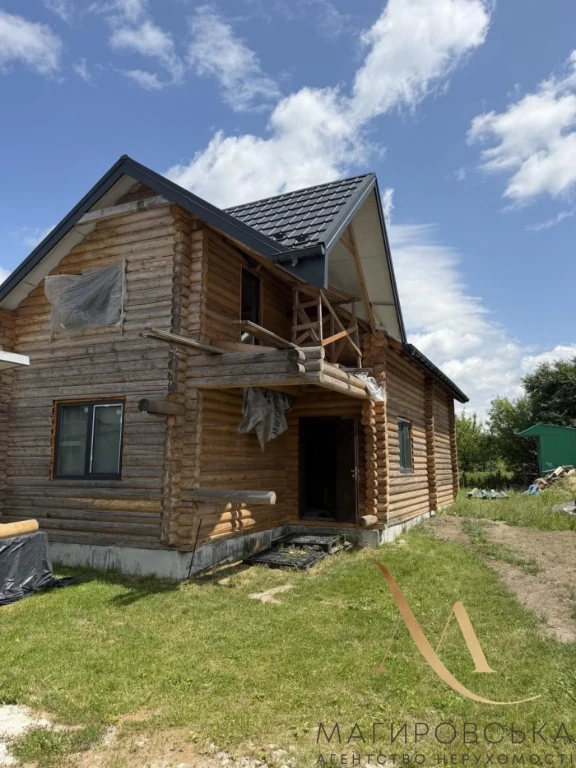 Продаж будинку зі зруба на ділянці під інд. будівництво по в