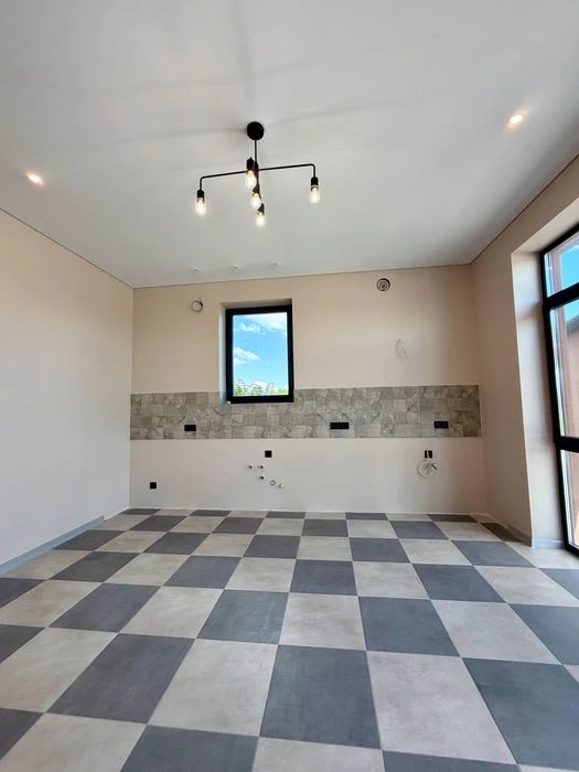 Stylish one-story house of 98 m² on 10 acres, just 1 km to