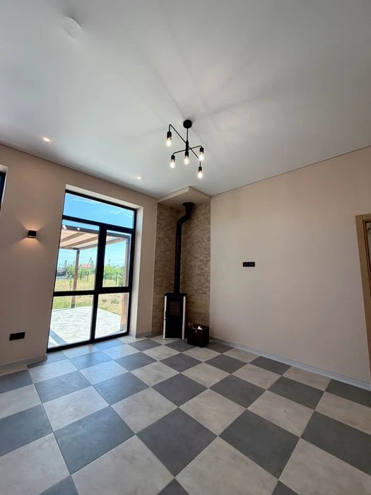 Stylish one-story house of 98 m² on 10 acres, just 1 km to