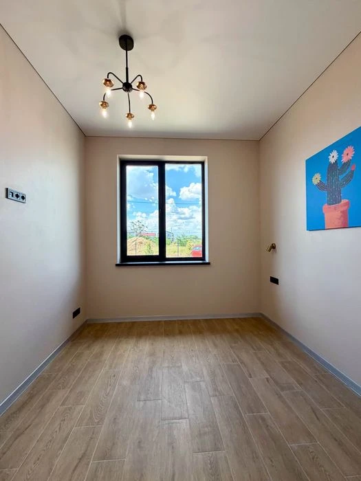 Stylish one-story house of 98 m² on 10 acres, just 1 km to