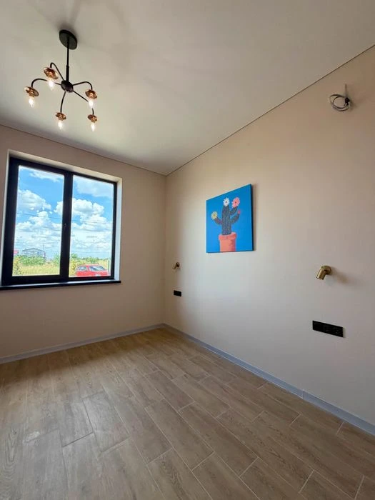 Stylish one-story house of 98 m² on 10 acres, just 1 km to
