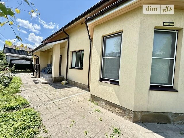 Продаж 2 поверхового будинку з гаражем і ділянкою на 16 сото