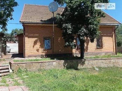 Продаж 1 поверхового будинку з гаражем і ділянкою на 4 сотки